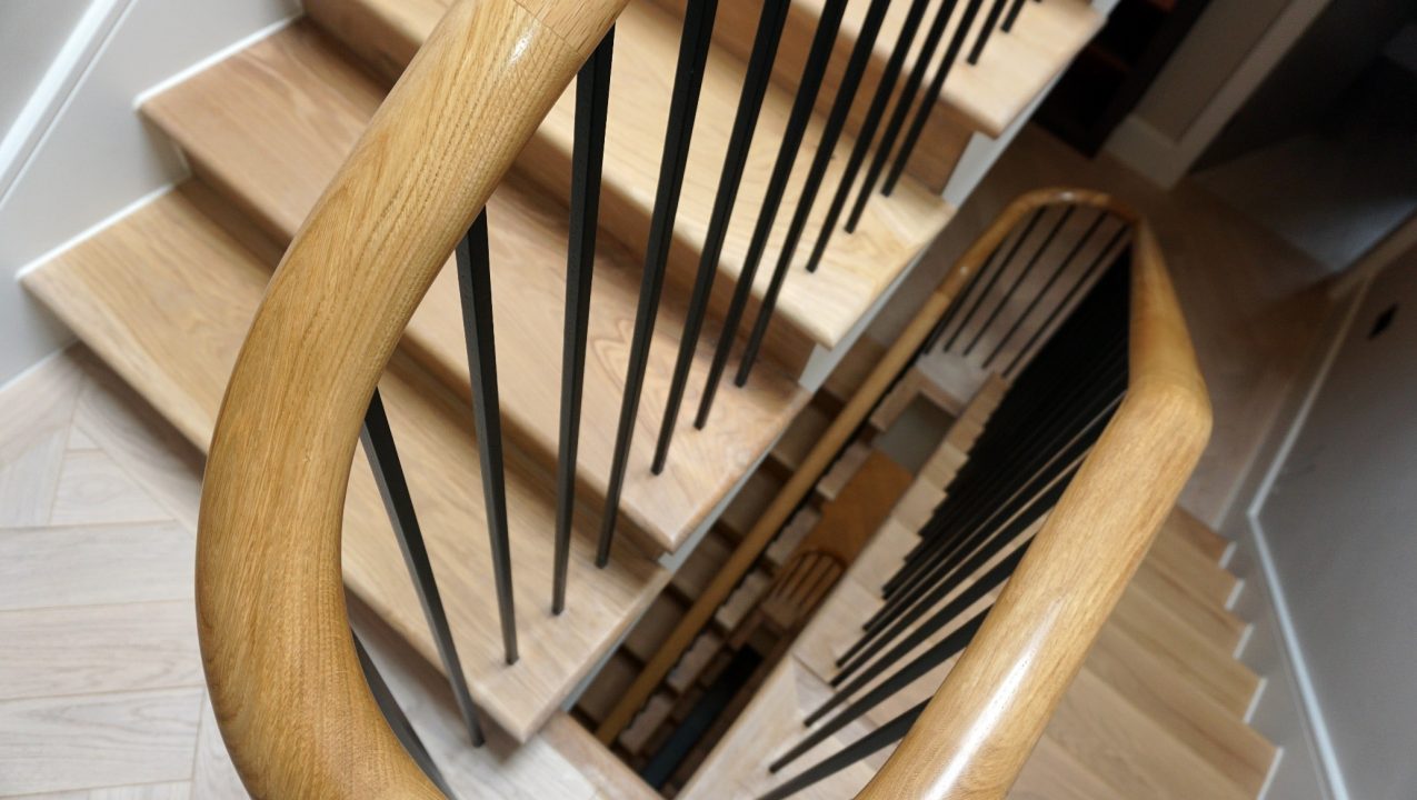 Flowing stylish finish in this staircase handrail installation in Wilmslow Cheshire by PT Handrails, Clive Durose