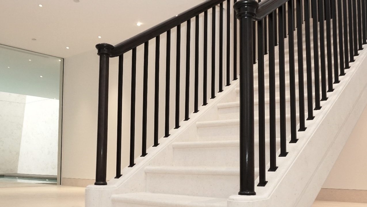 Newel staircase rail posts close up by Precision Timber Handrails